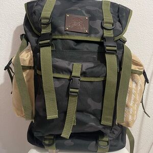 Wolves Club Traveler Backpack in
Black Camo/Olive